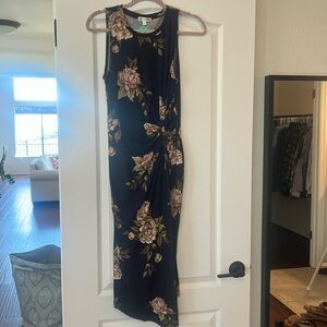 Beautiful midi dress. Poly/spandex. Knot waist detail makes it super flattering